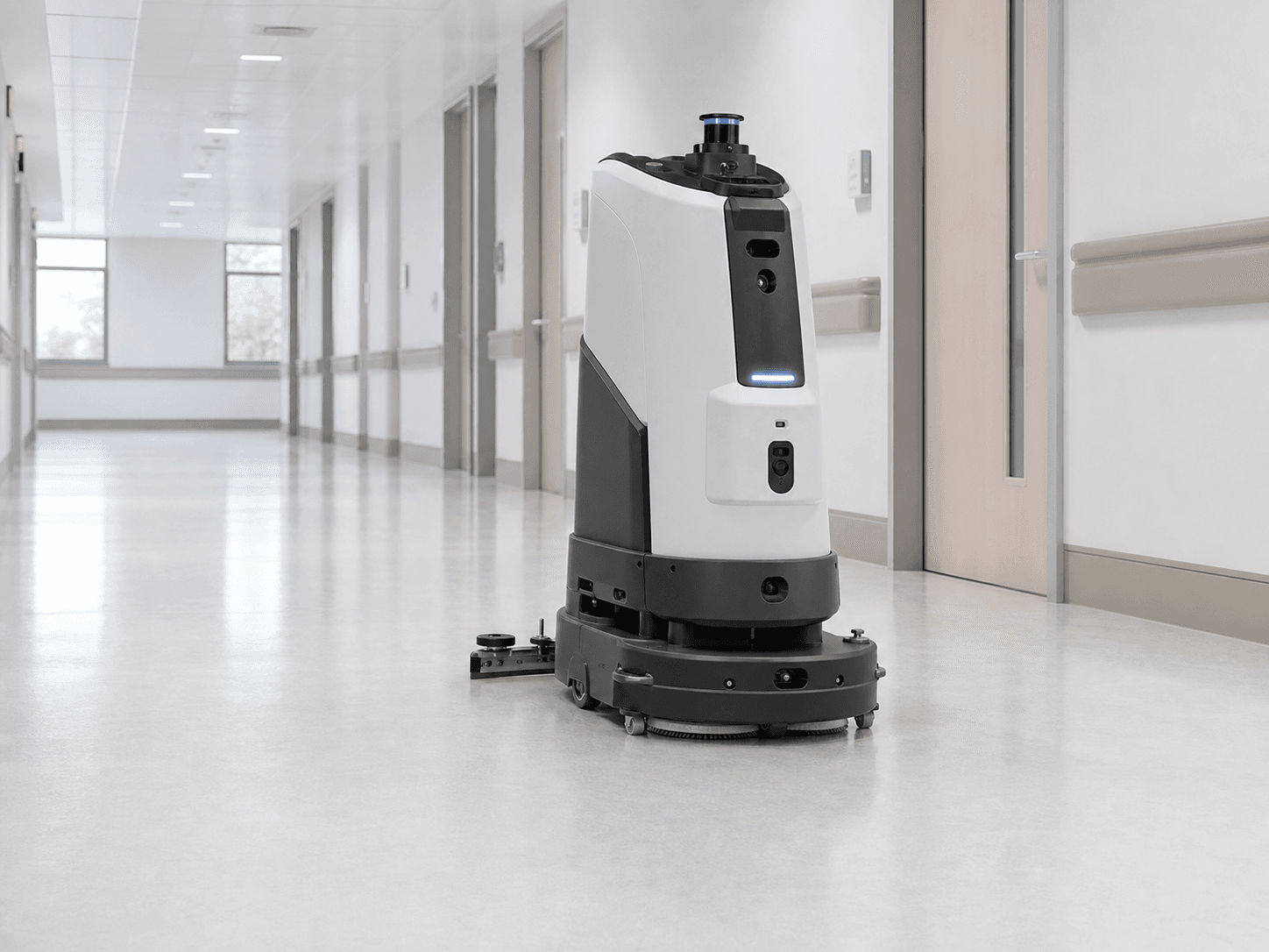 Illustrative autonomous commercial scrubber in a healthcare corridor