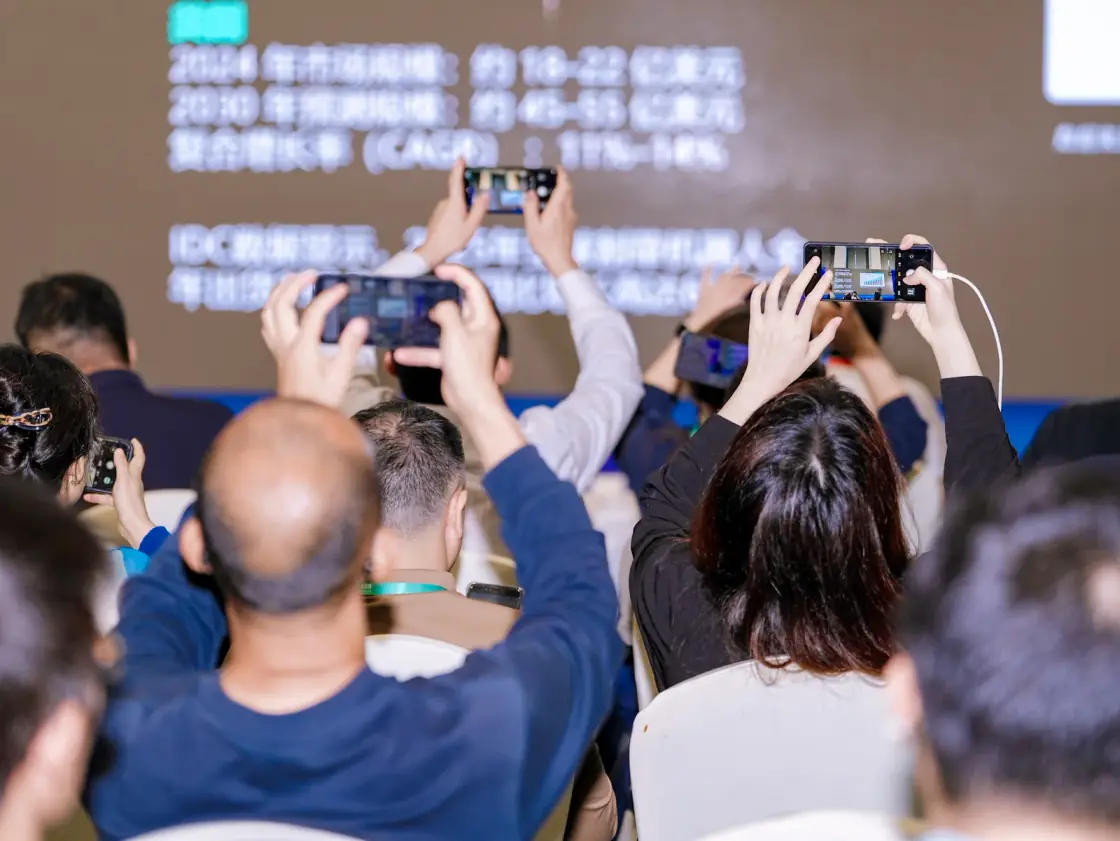 March 2026 · Shenzhen · Participants following the presentation