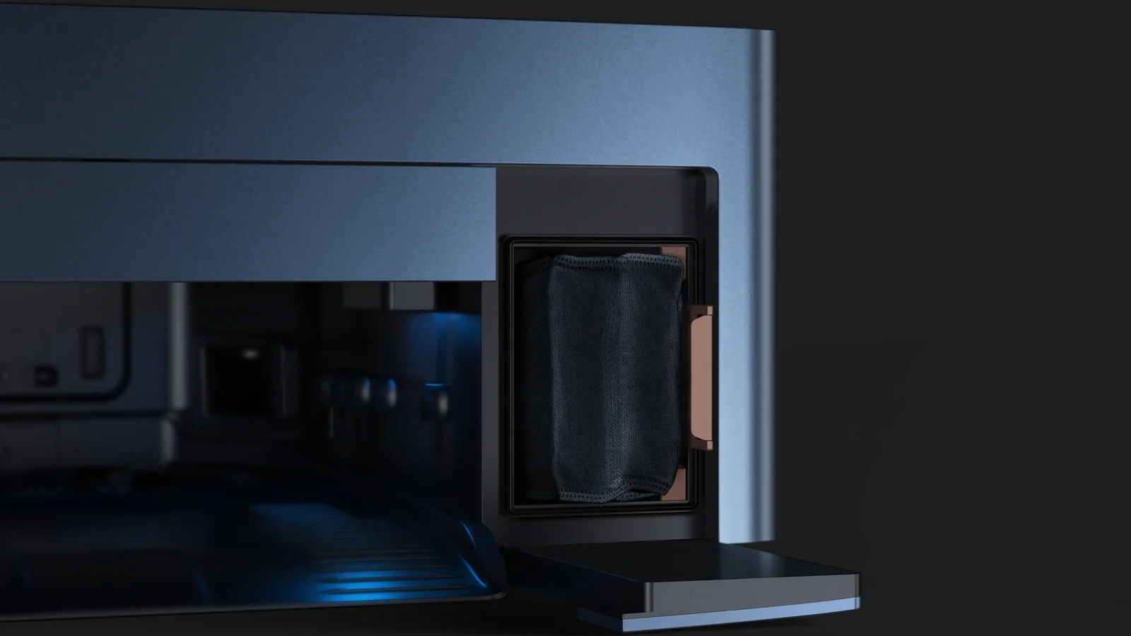 Close-up of the accessible dust-bag compartment in COLMO's official dual-wash-station imagery
