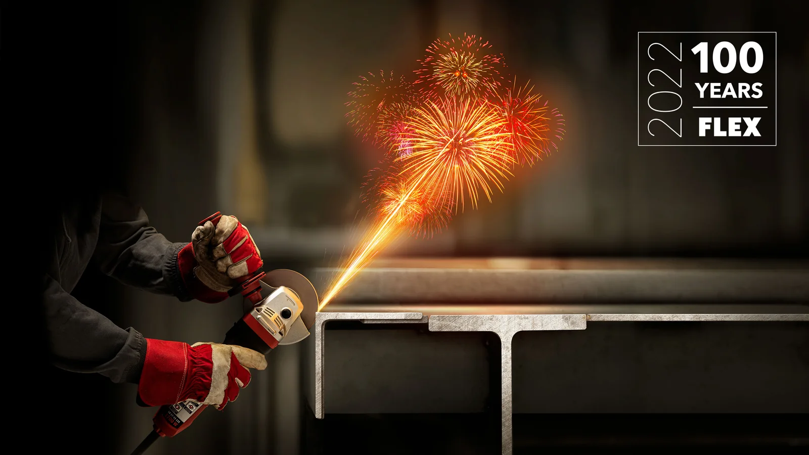 FLEX's official 2022 centenary artwork, showing a grinder cutting metal with sparks stylized as fireworks.