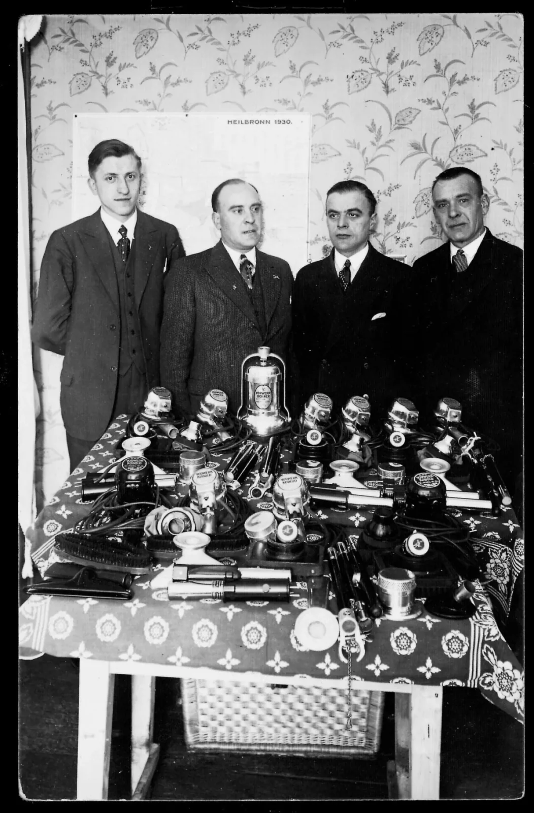 An early Vorwerk sales team with Kobold machines, around 1930