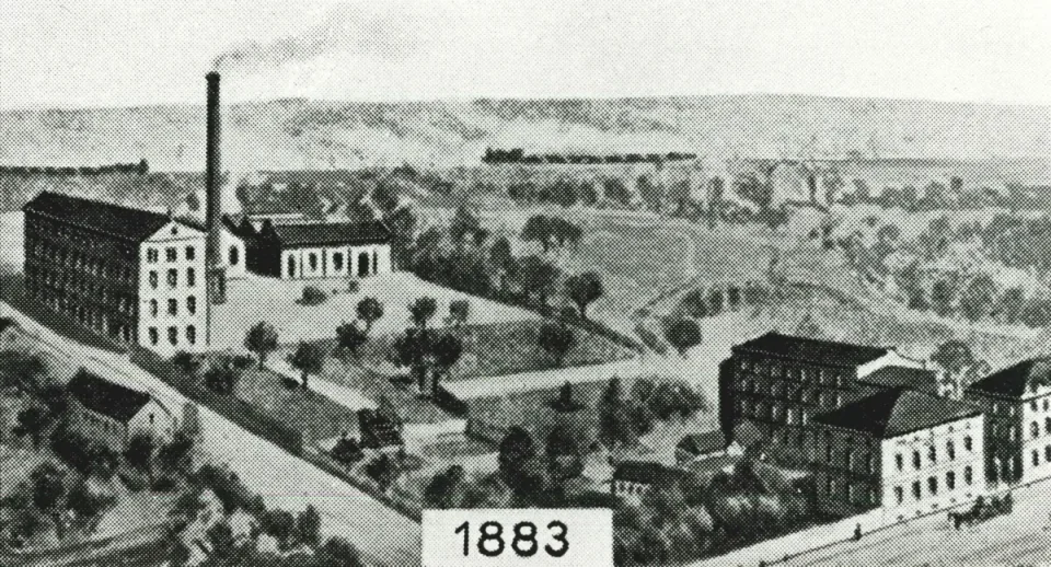 Archival illustration of Vorwerk’s Mühlenweg carpet factory, labeled 1883