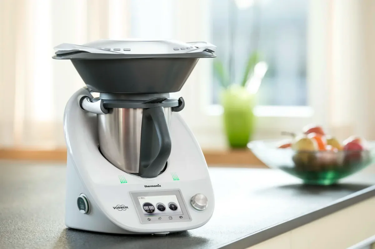 Thermomix TM5 with its touchscreen and Varoma attachment in a kitchen