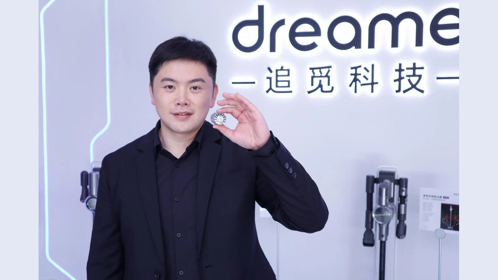 Dreame founder Yu Hao at a company display