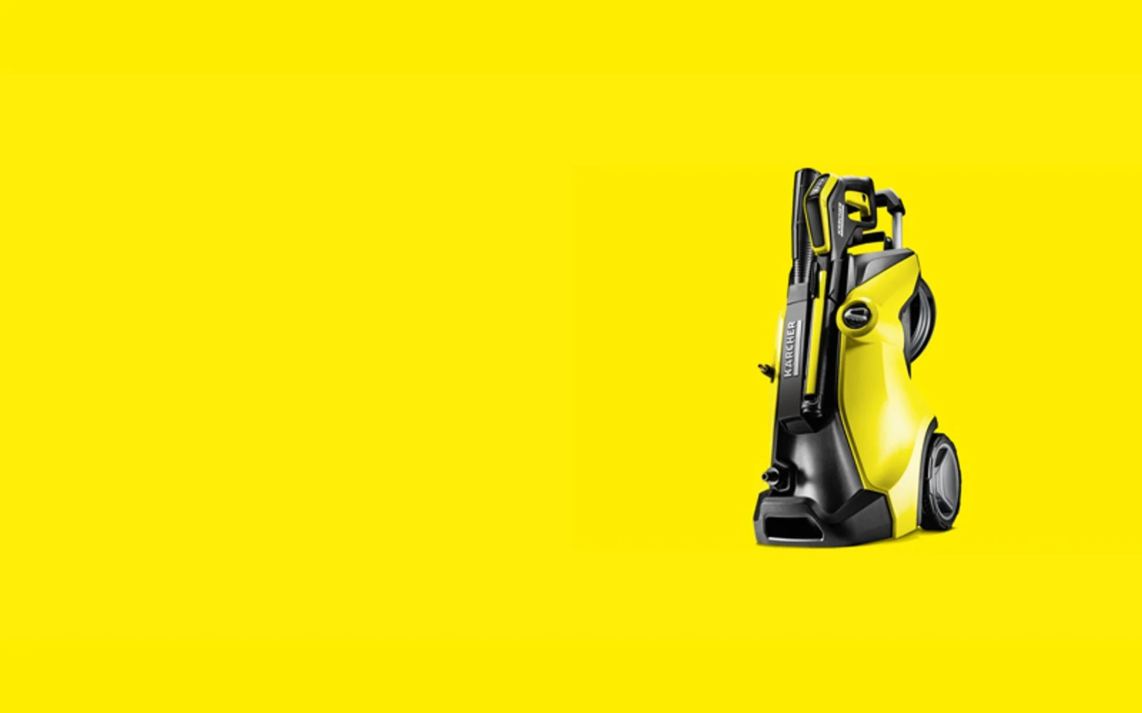 Kärcher professional pressure washer on the brand's yellow background