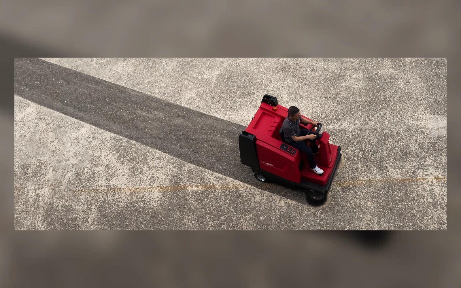 RCM Supra ride-on floor-cleaning machine on an industrial floor surface