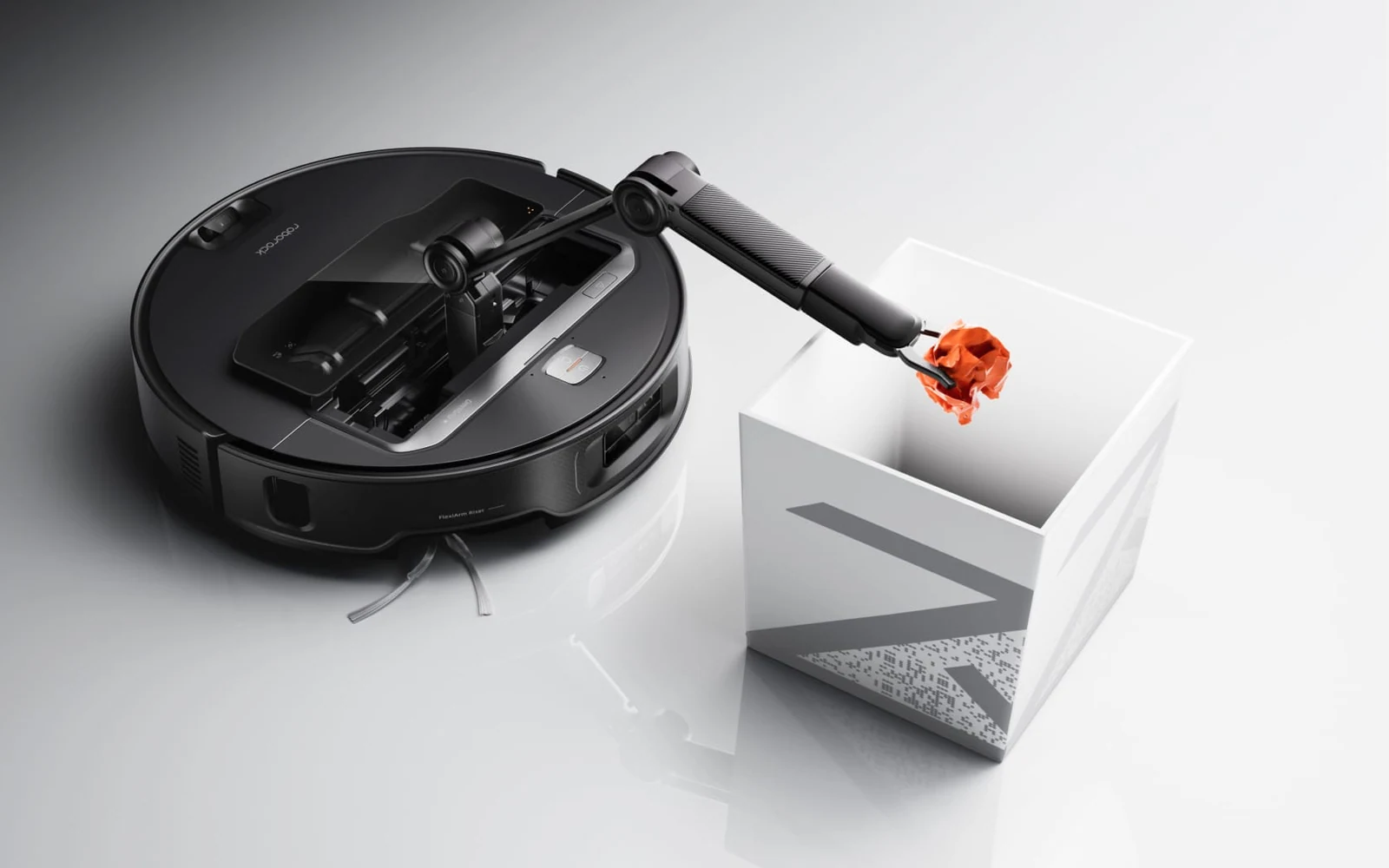Roborock Saros Z70 robot vacuum using its OmniGrip mechanical arm